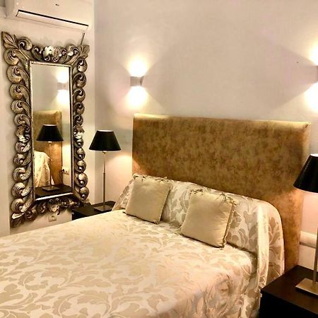 Apartamento ตอร์เรโมลิโนส ภายนอก รูปภาพ